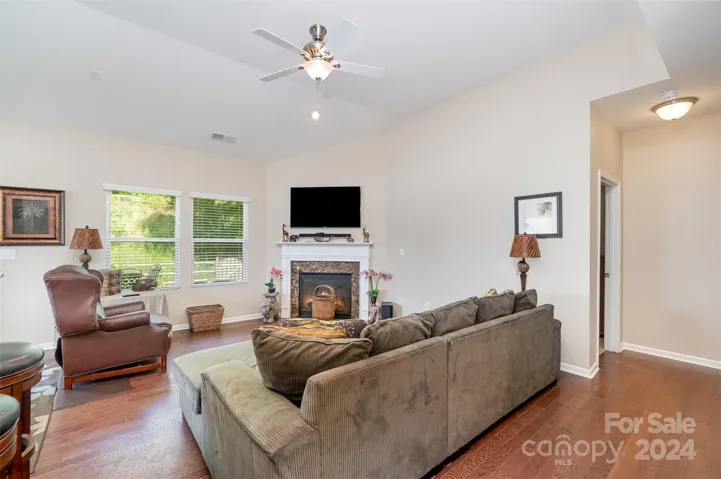 Living room with corner fireplace