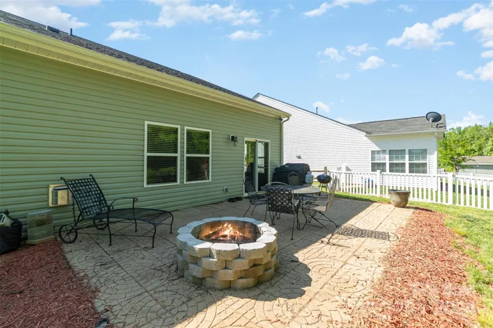 Enjoy the privacy of the back yard complete with fire pit