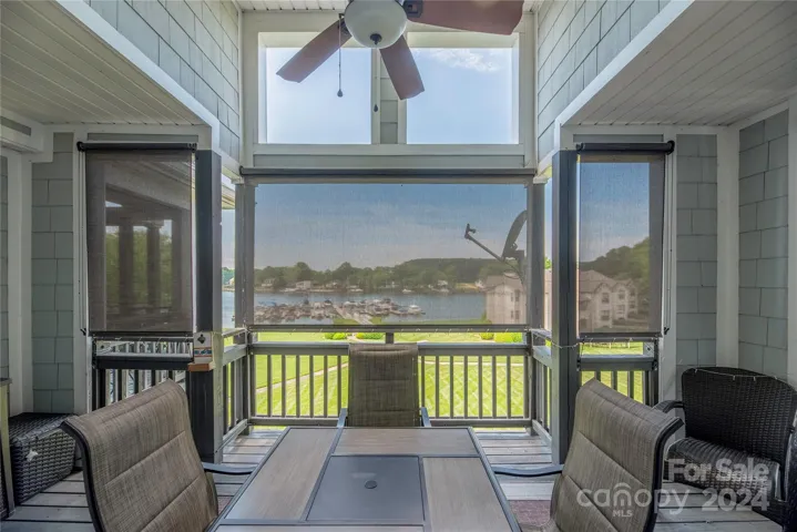 Covered Balcony features custom privacy shades