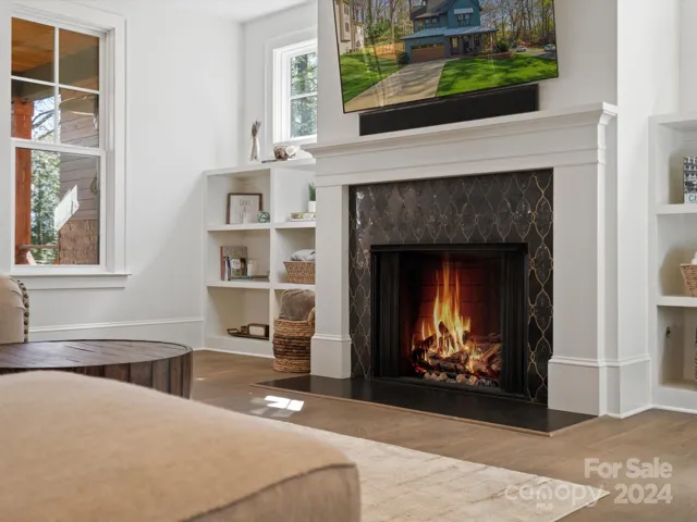 custom gas fireplace with custom tile surround