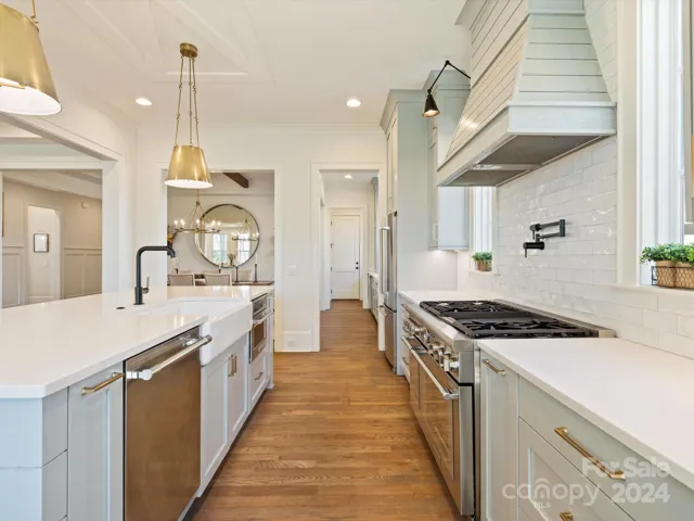 Open concept kitchen with high end appliance package