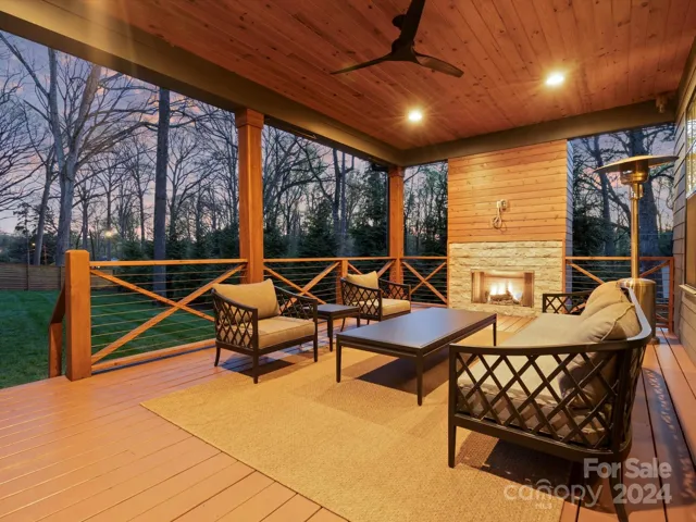 Back porch with full gas fireplace and media hookup