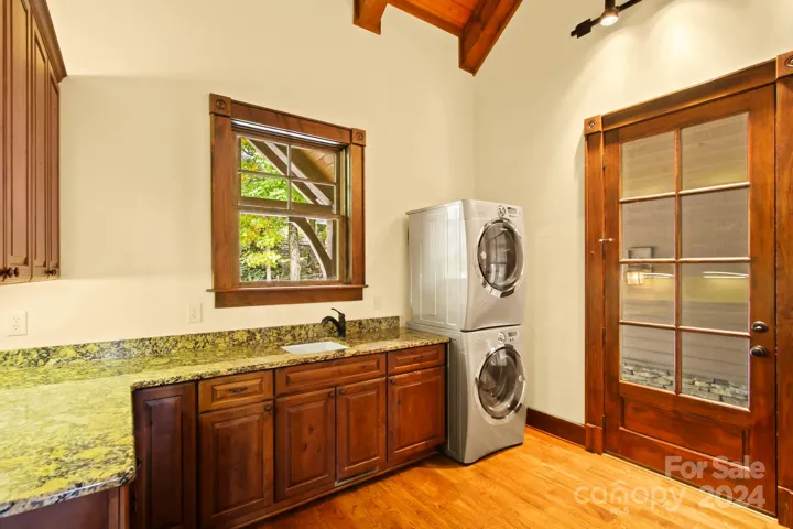 Main-level laundry, doubles as a mud room