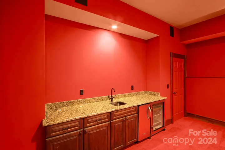 Lower-level theater room - wet bar!