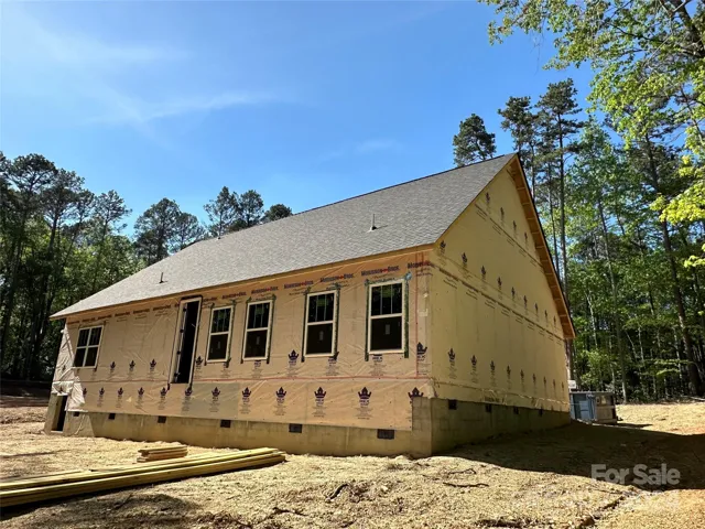 Left side and rear elevation of Your New Home