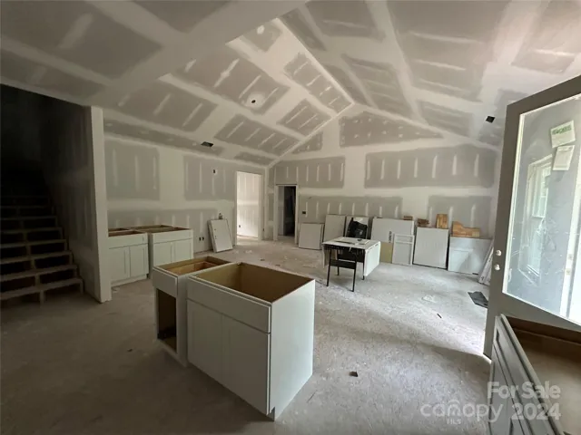 Kitchen view with island and Great Room