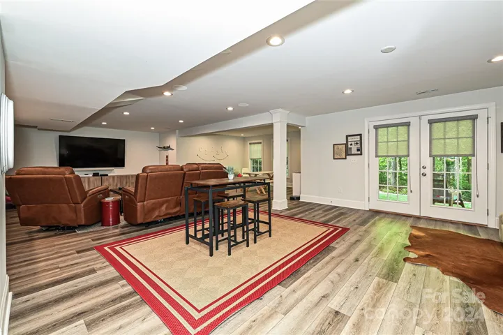 A huge Recreation Room set up for A/V excellence is the highlight of the recently finished basement.