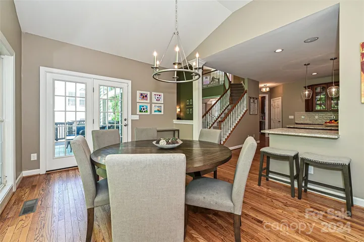 Just off of the Kitchen, the Sunroom is a perfect place for informal dining.