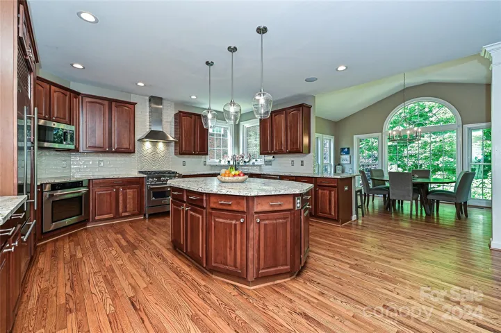 A large Center Island is the centerpiece of the stunning Kitchen.