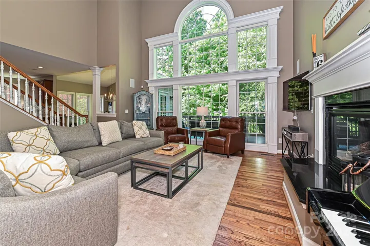The abundant natural light continues to stream in through the Wall of Windows in the Great Room.