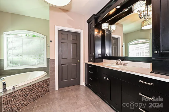 Primary Bath #1 offers a modern, updated feel.