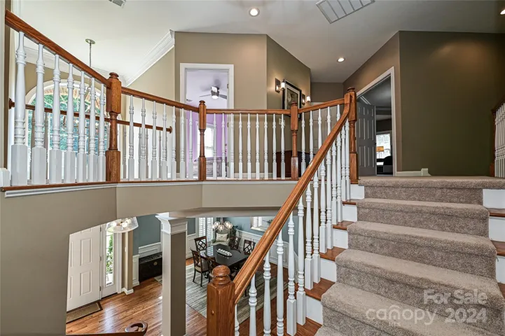 The dramatic front Staircase ends upstairs at a spacious landing, where you'll also find access to the rear Staircase.