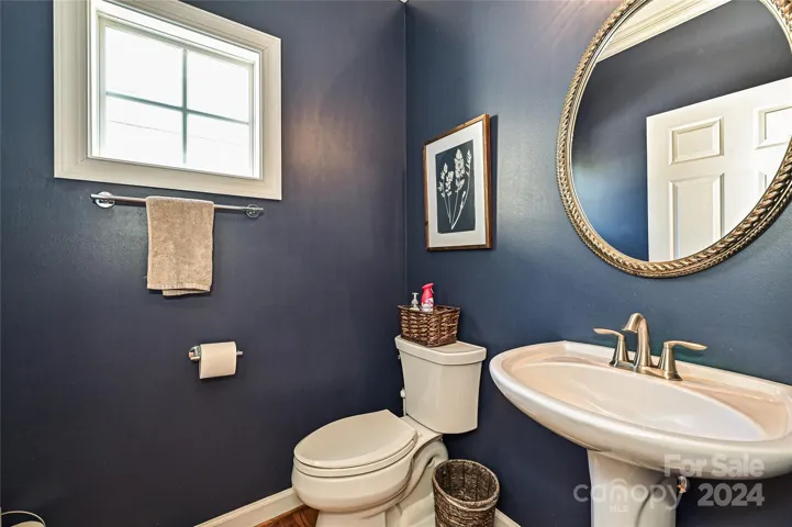 The Powder Room includes elegant and modern finishes.