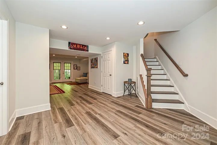 A spacious Landing greets you into this recently finished Basement.