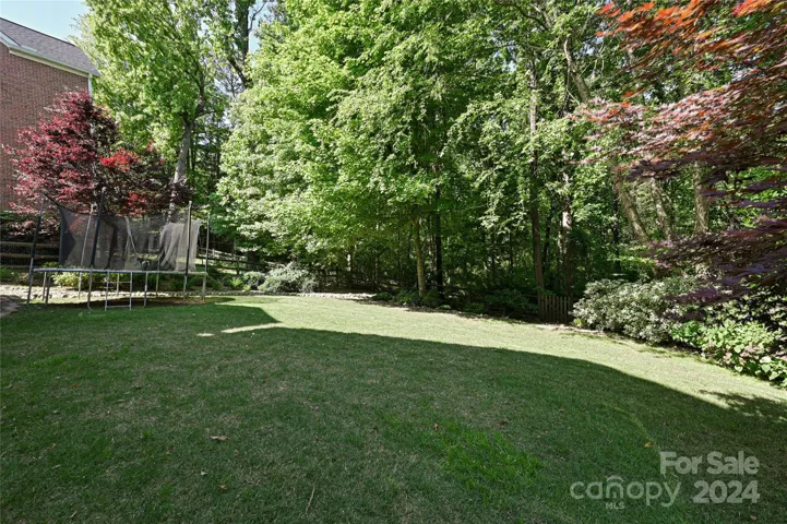 A Gate at the rear of your wooded rear yard leads directly to a mountain biking/ hiking trail!