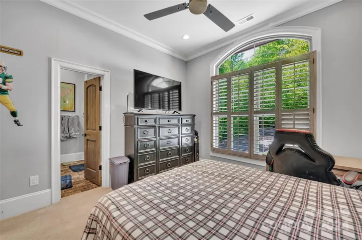 Secondary bedroom #2 w/ reclaimed plantation shutters