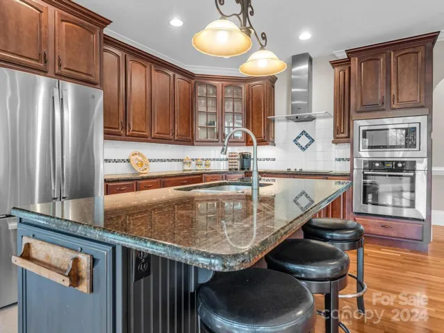 Island sink with granite tops.