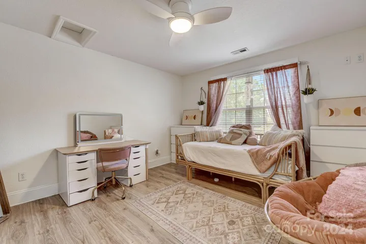 Bedroom with scuttle hole access to play room