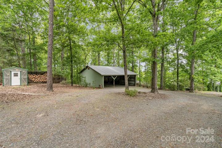 Barn and year supply of cut firewood and wired greenhouse
