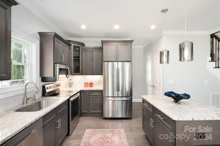 Granite countertops and stainless steel appliances