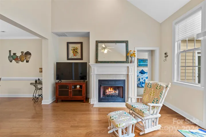 Gas fireplace in living room, opens to large rear deck