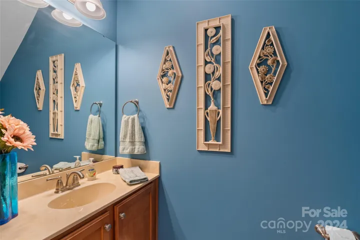 Main level half bath for guests