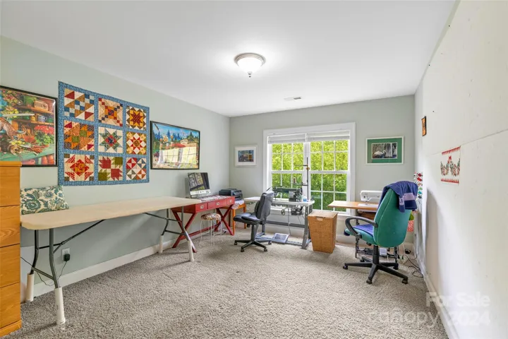 2nd guest bedroom is large and spacious, currently used as a hobby room