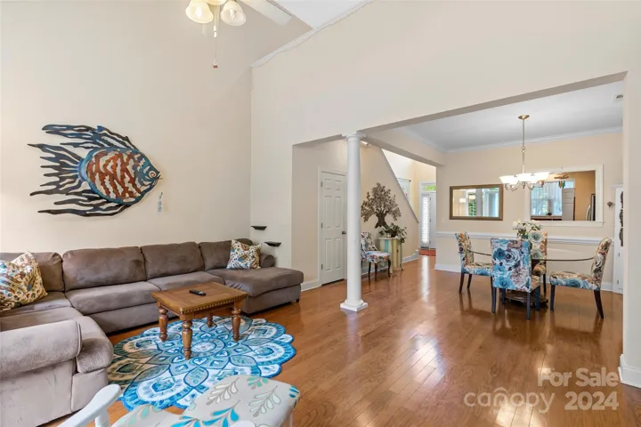 Main areas offer gleaming hardwood floors and open concept plan
