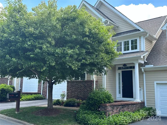 Paved parking area is level with 1 car main level garage