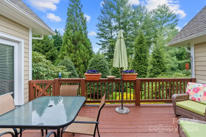 Large open rear deck to enjoy the landscaped rear privacy