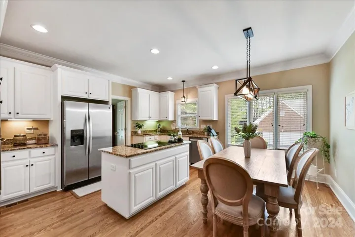 Remodeled Kitchen has White Cabinets, Granite Counters SS Appliances, New Fixtures