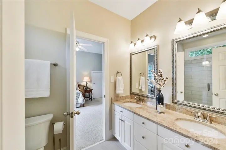 Jack and Jill Bath services Bedrooms 2 & 3 with Solid Surface Counters