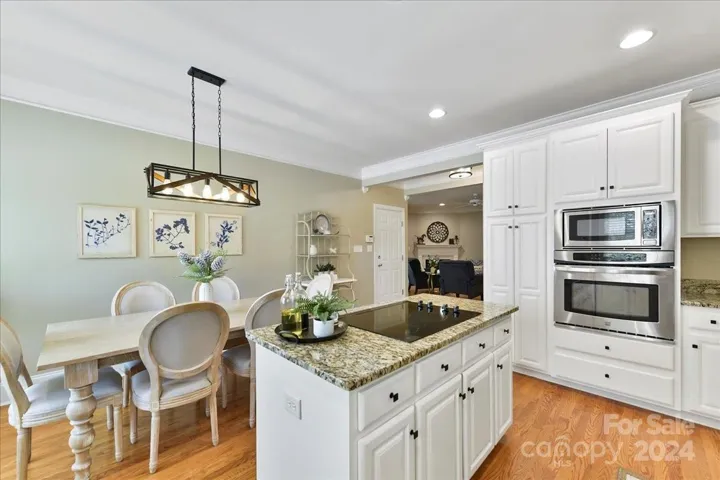 Wall Micro and Oven and Large Breakfast area with new Fixture