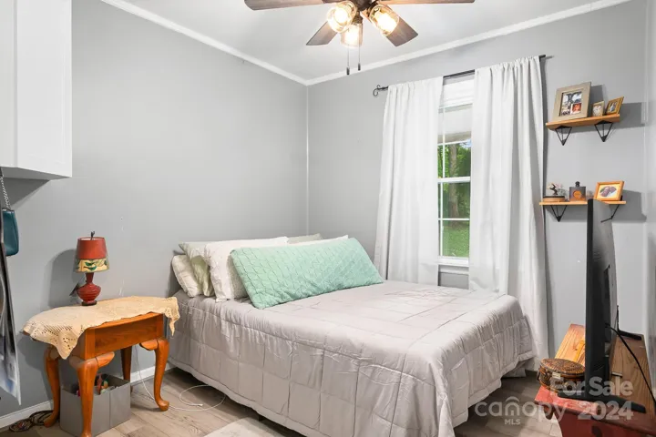 Bedroom 2 with ceiling fan.