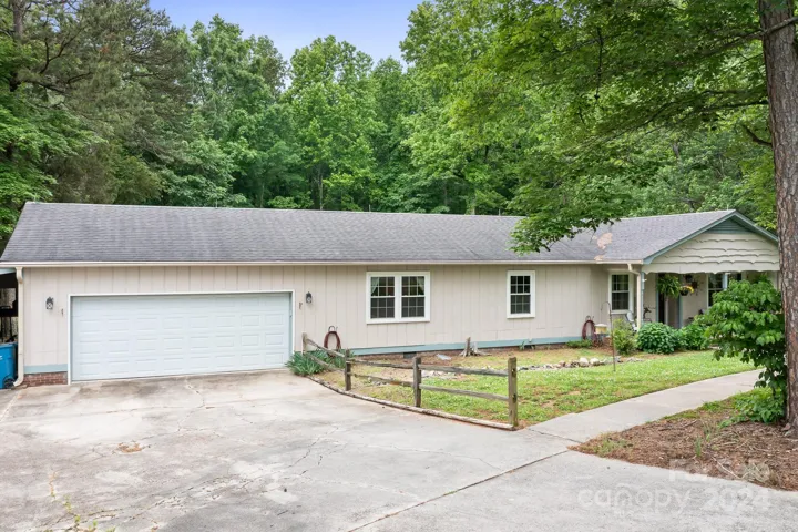 Large 2 car garage and attached carport on left not pictured