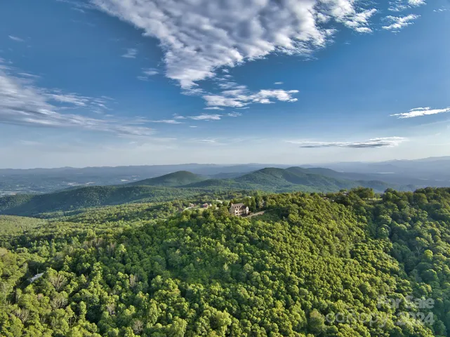 Drone view of the home, located at the top of the ridge at the end of Snow Ridge drive at 3,800ft.