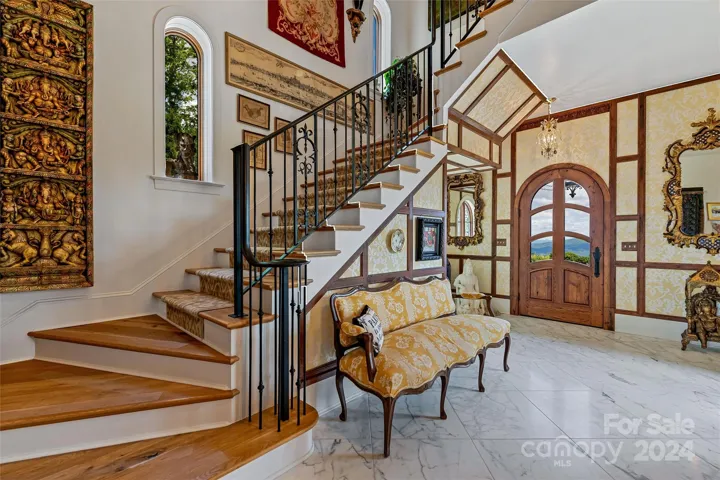 Beautiful view of the grand staircase leading to the second level.
