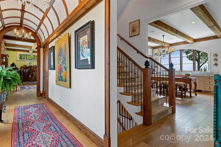 Gallery view into the kitchen and central staircase.