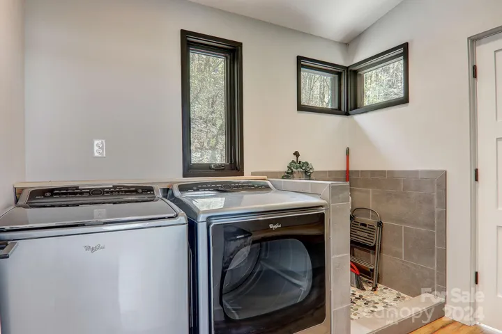 Laundry on the Main Floor with Tiled Dog Wash