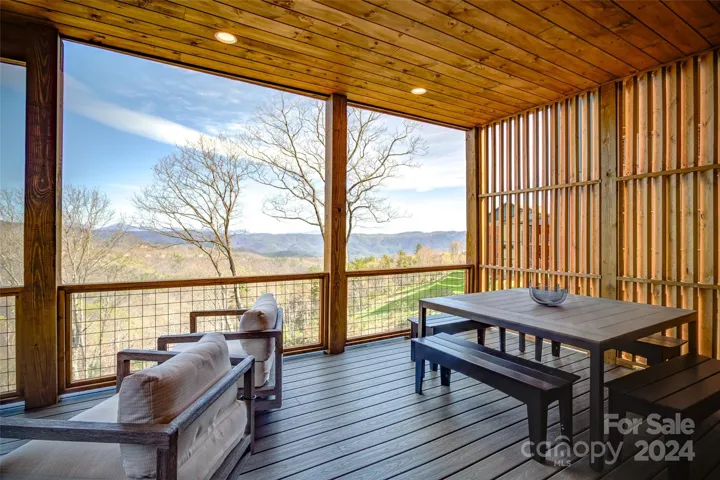 Al fresco dining with long-range, layered views is possible from the 2nd floor deck
