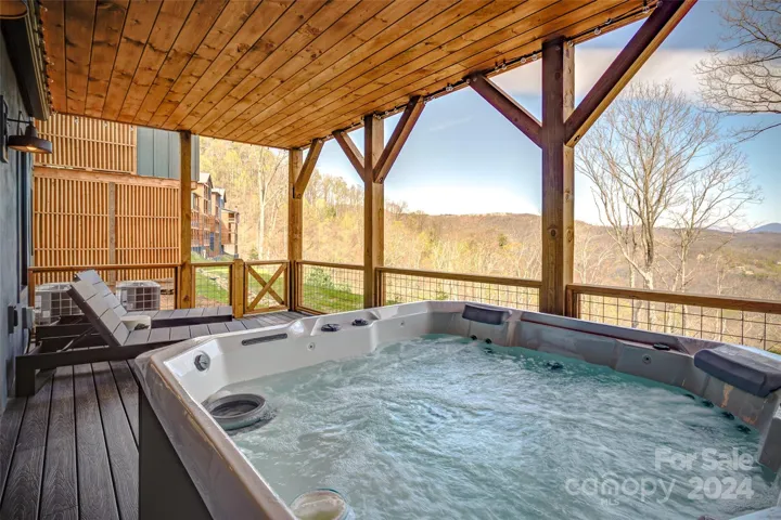 Lower level/basement deck hot tub and VIEWS even from this level.