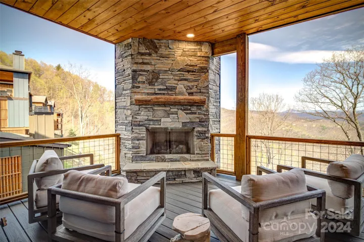 3rd level deck also features a gas log outdoor fireplace and plenty of seating area