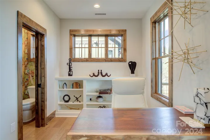 3rd level office area & half-bath are located off the living room