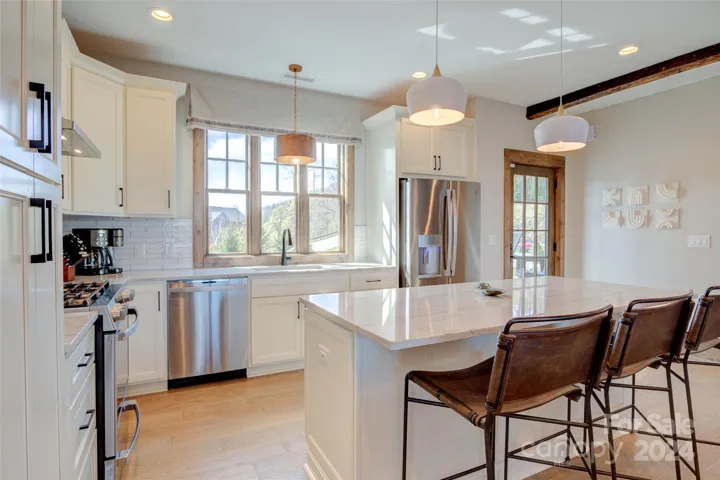 Light & bright kitchen viewed from the dining area