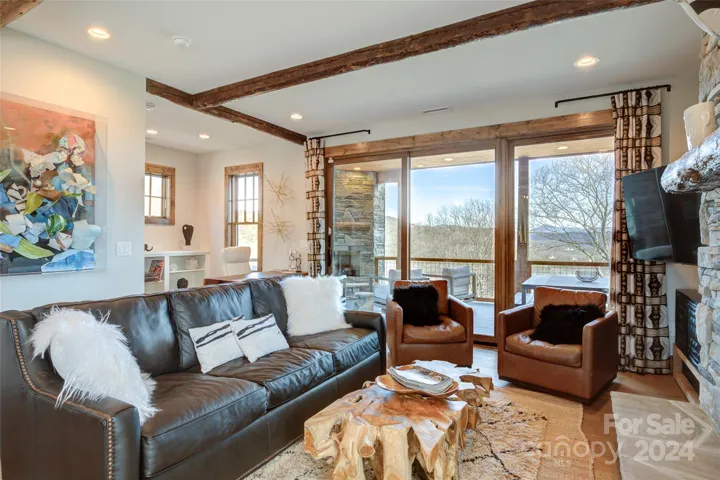 Living room with huge views, and office area and half bath to the left