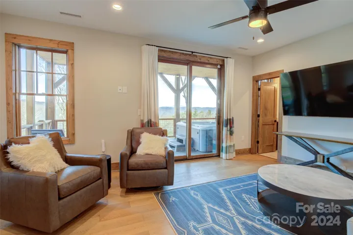 Lower level bedroom w/ensuite bath is currently used as a den. Access to the hot tub is from this level.