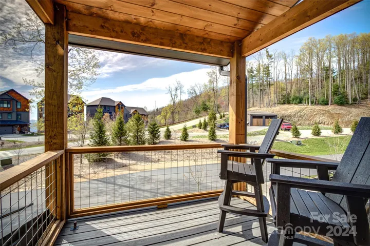 Sitting deck located off the kitchen, front of home
