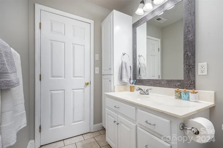 Main Bathroom with Tub/Shower combo and tile floors