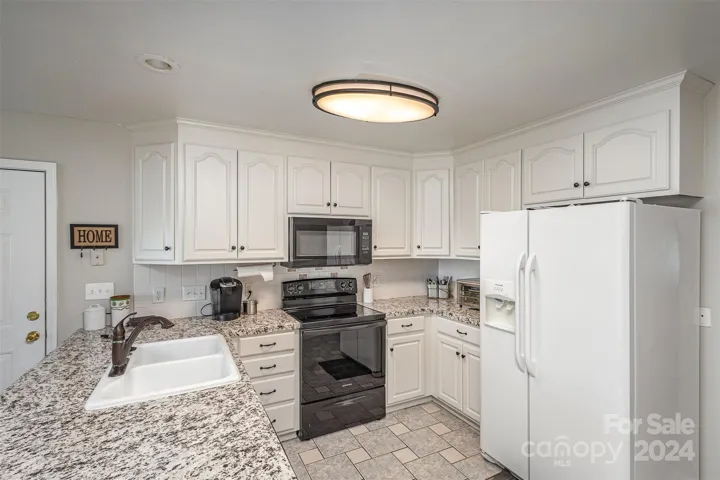 Kitchen with new Range and Microwave