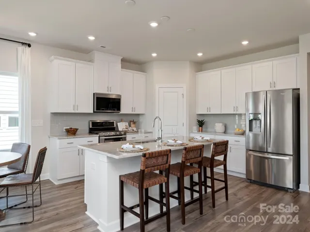 Photo is not of the actual home, but is an inspirational photo of builder’s model home and may depict options, furnishings, and/or decorator features that are not included
